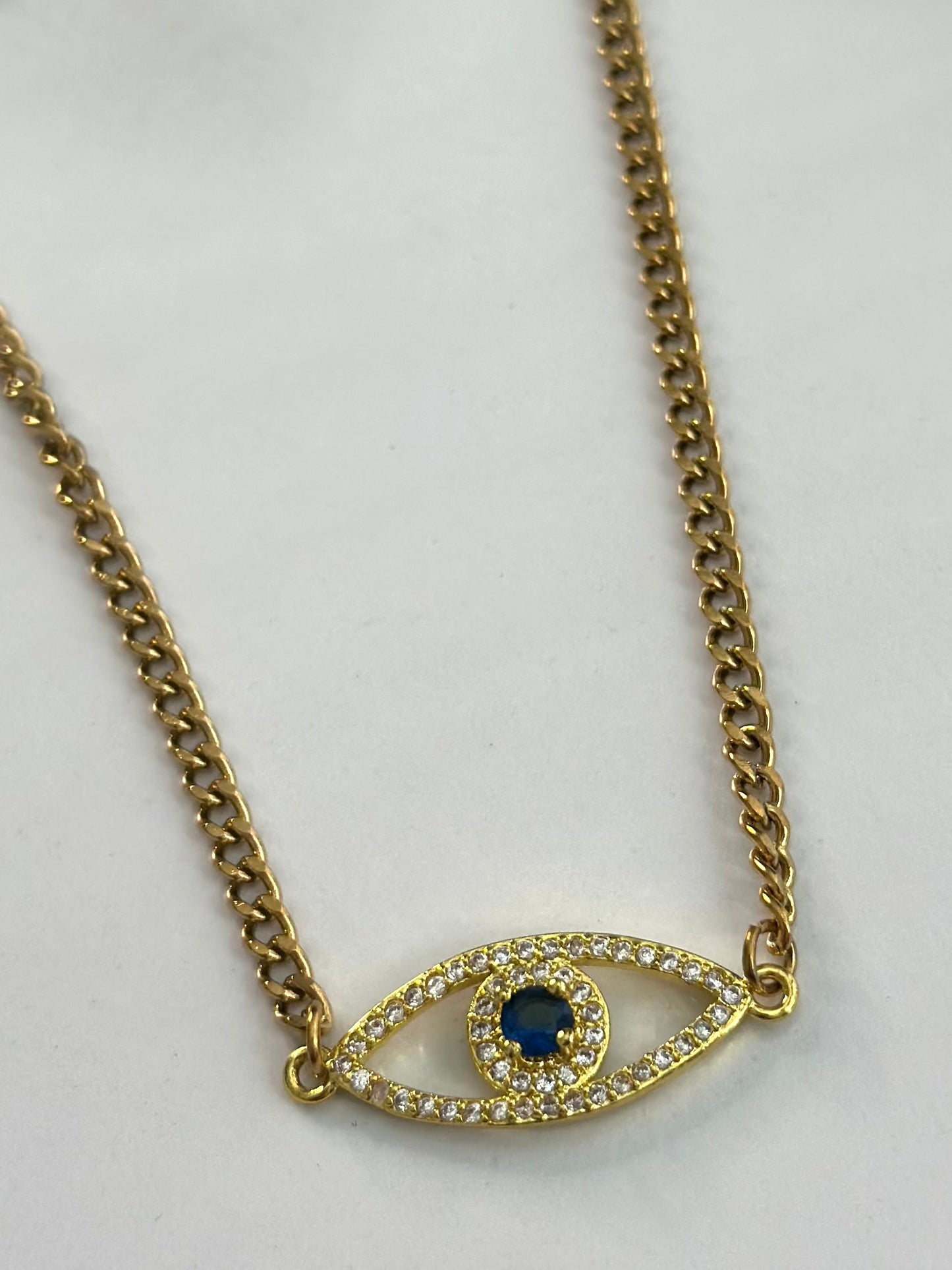 Alicia’s signature all seeing eye necklace