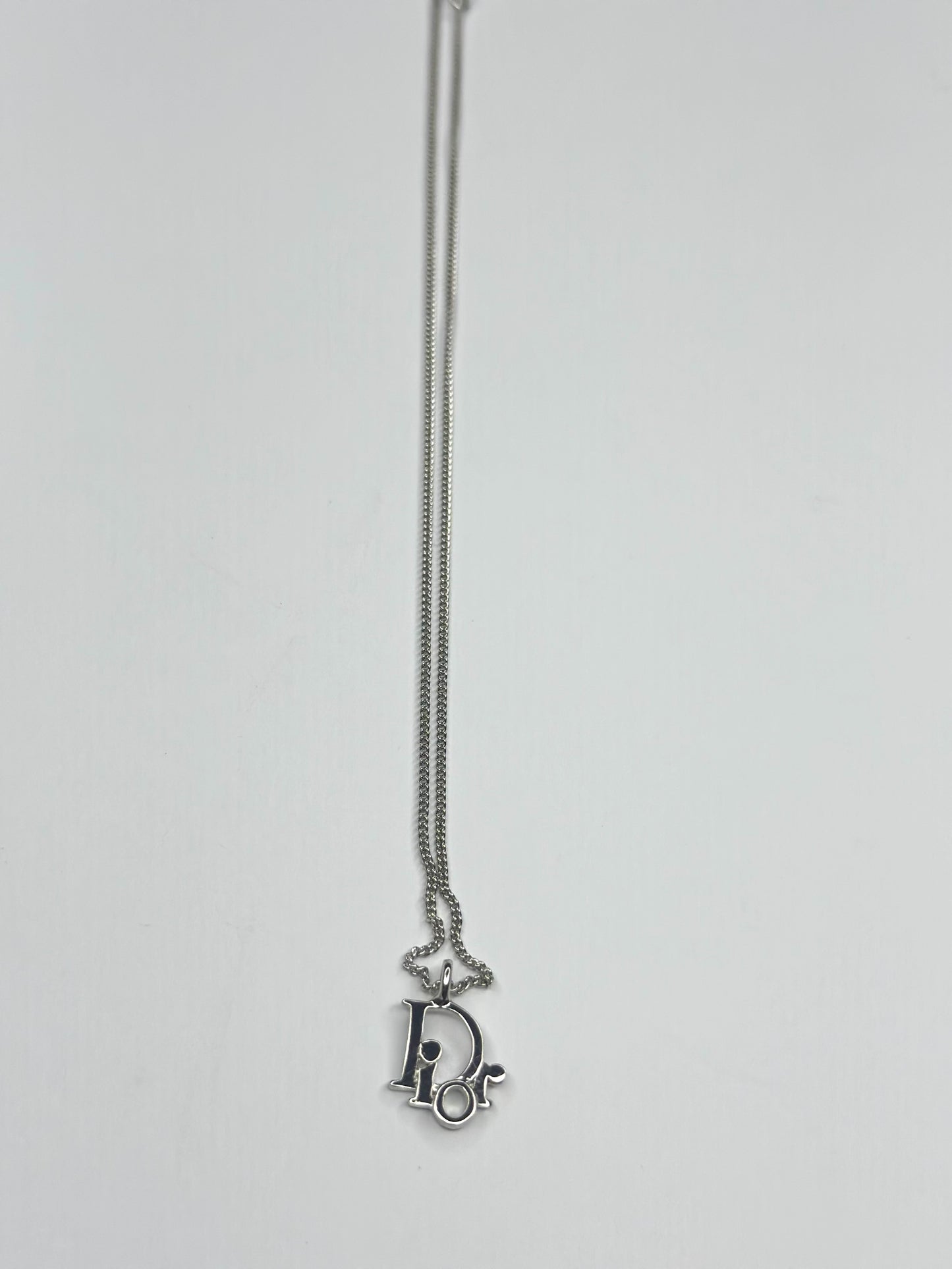 Pre-owned Christian Dior, silver logo pendant necklace