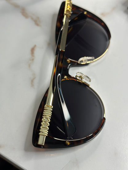 Pre-owned Moschino tortoise cat eye sunglasses