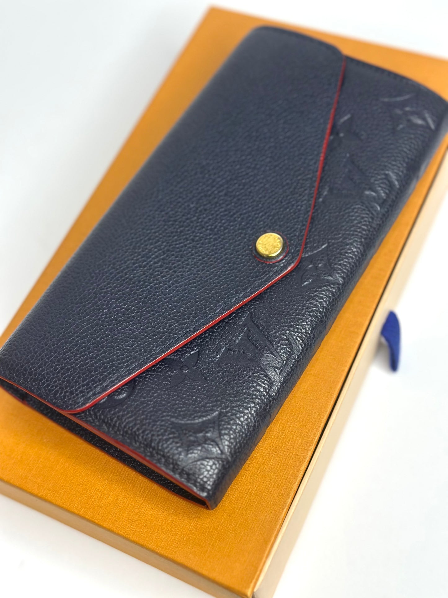 Pre-owned Louis Vuitton Sarah wallet in Marine Rouge Monogram Empreinte leather
