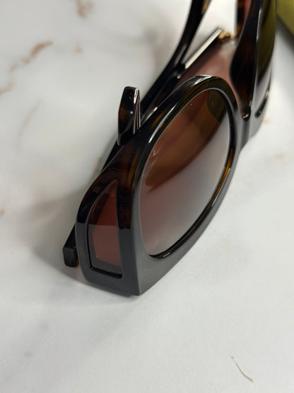 Pre-owned Gucci tortoise sunglasses with gold hardware