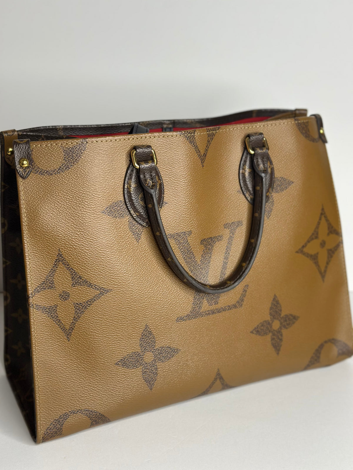 Pre-owned Louis Vuitton reverse monogram canvas on the go MM tote