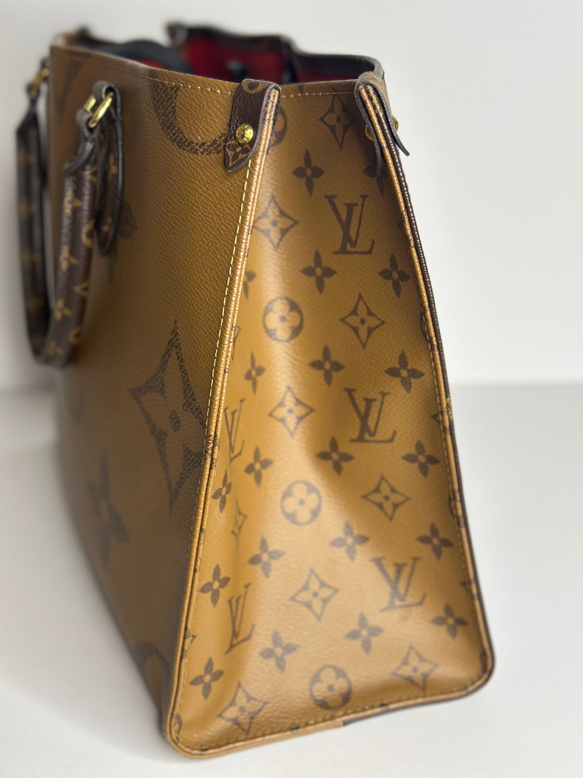 Pre-owned Louis Vuitton reverse monogram canvas on the go MM tote