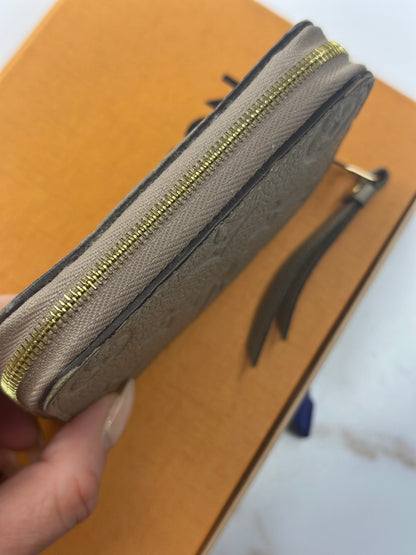 Pre-owned Louis Vuitton monogram Empriente leather compact zippy