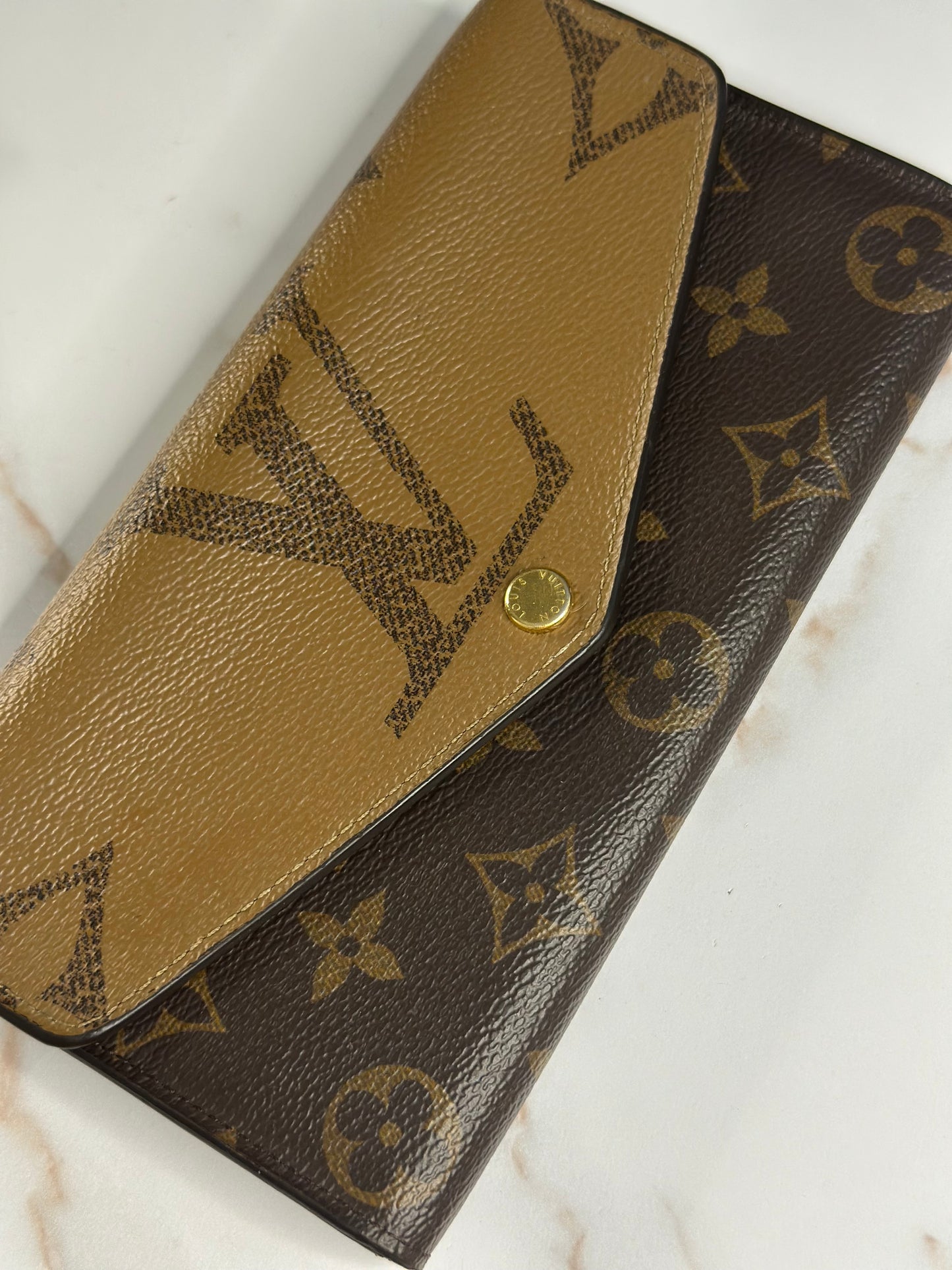 Pre-owned Louis Vuitton reverse monogram Sara wallet
