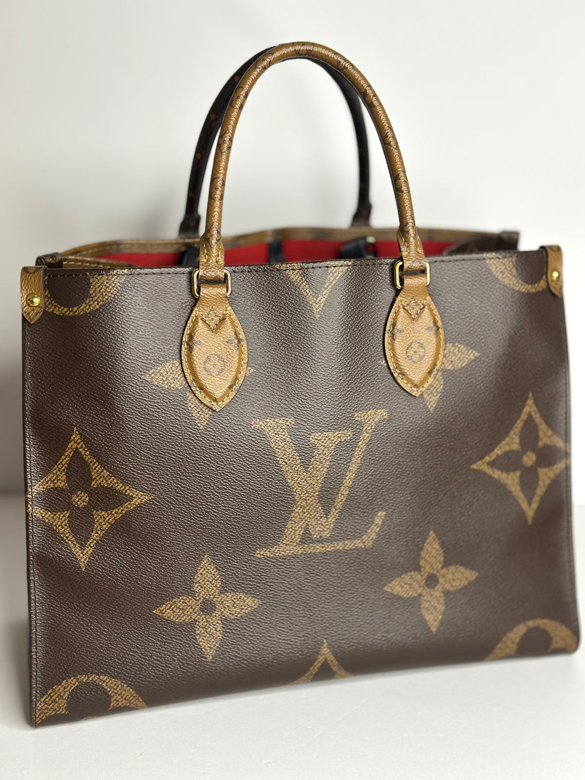 Pre-owned Louis Vuitton reverse monogram canvas on the go MM tote