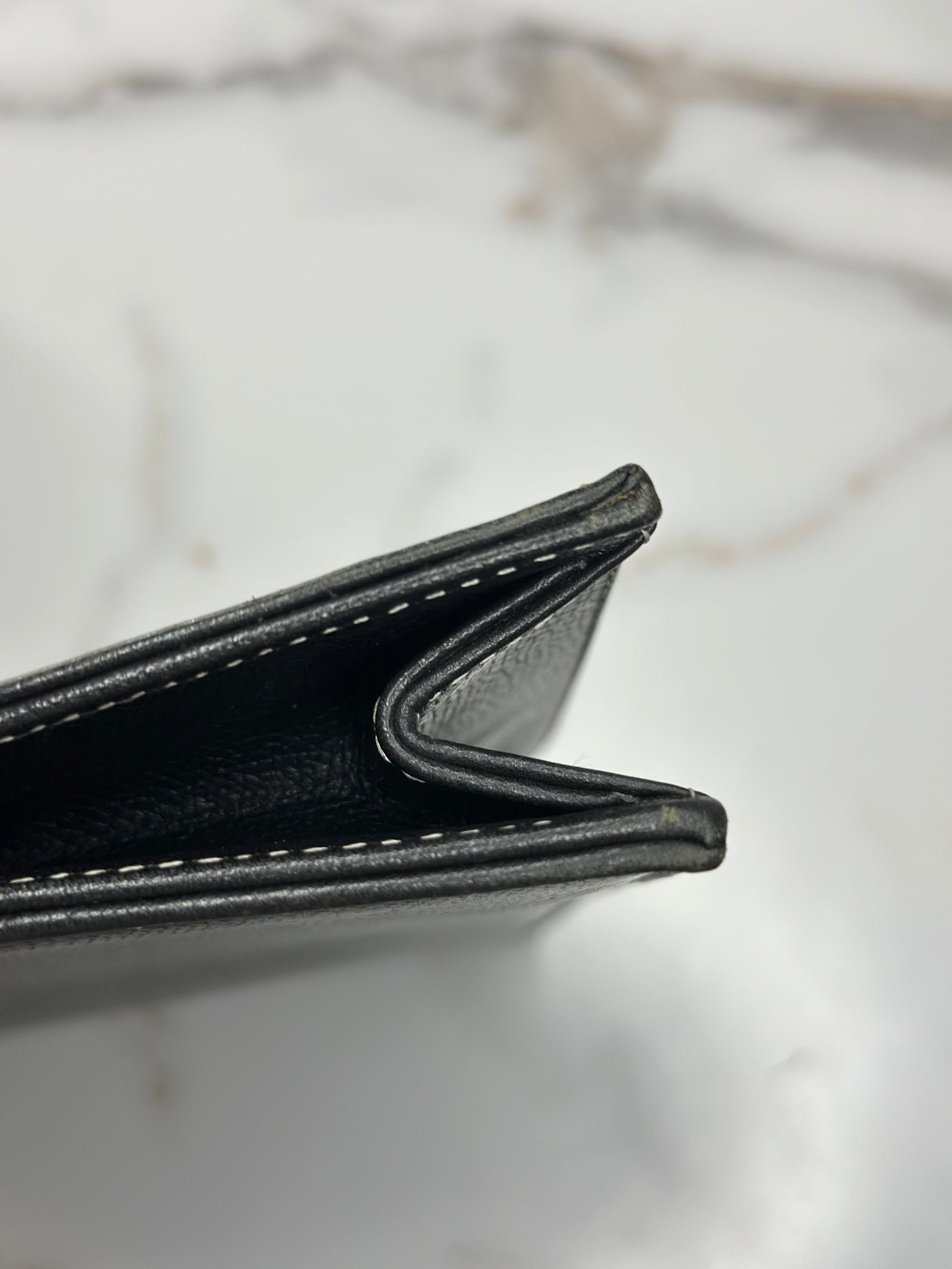 Pre-owned Saint Laurent pebbled leather black leather