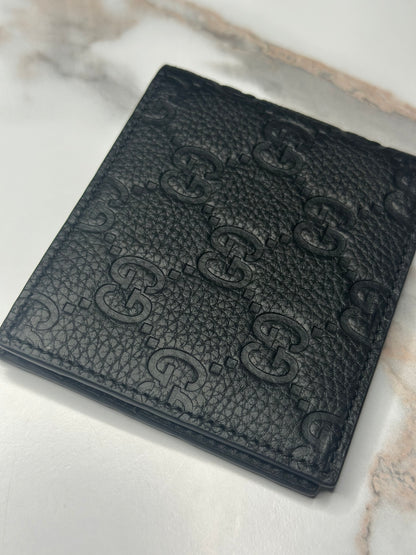 Pre-owned Gucci GG Embossed leather mens bi-fold wallet