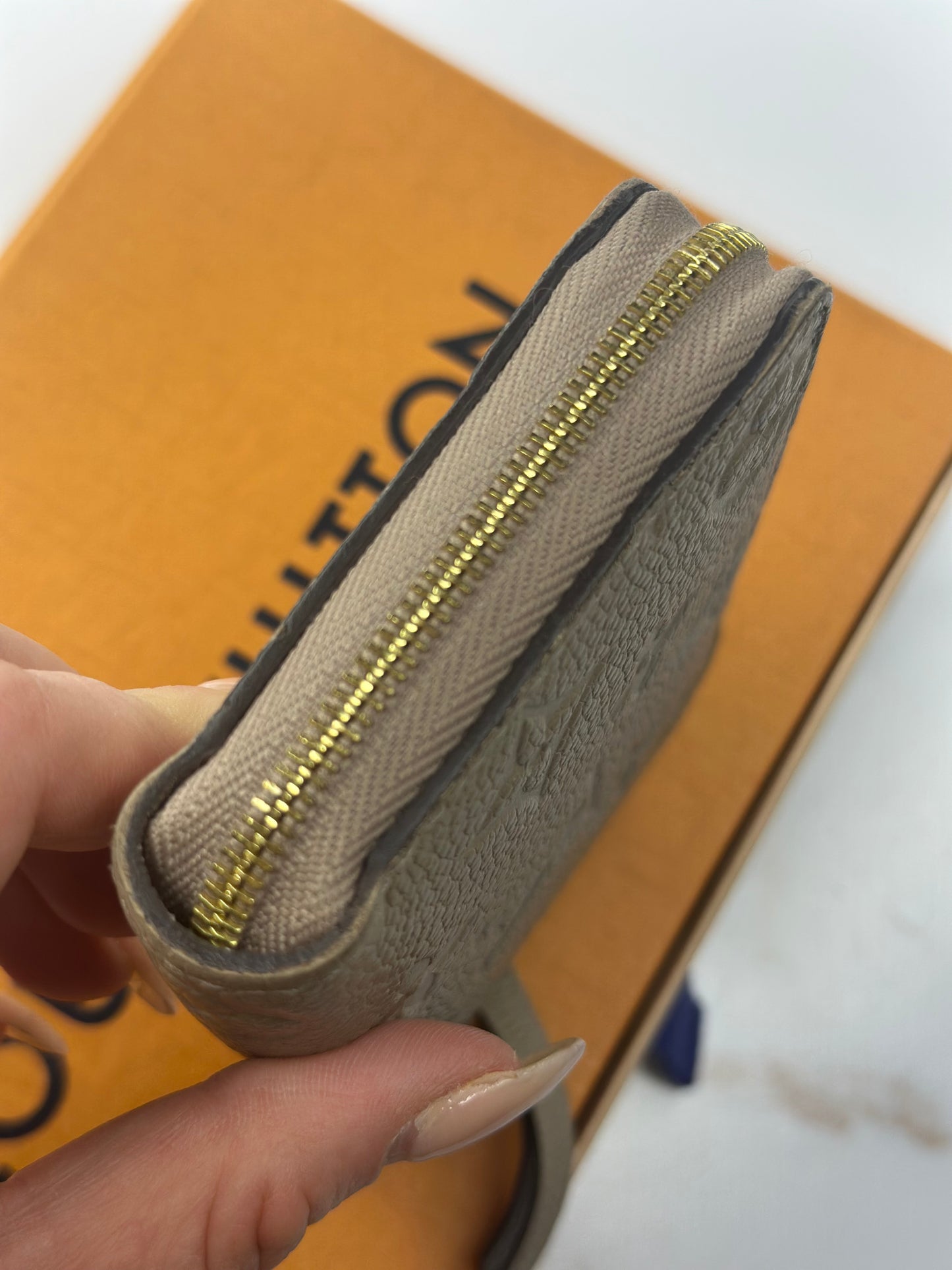 Pre-owned Louis Vuitton monogram Empriente leather compact zippy