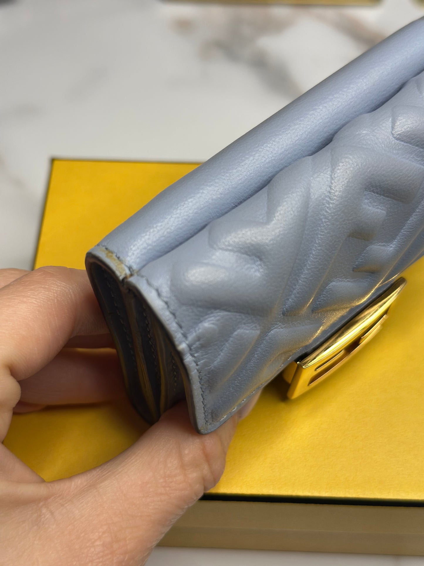 Pre-owned Fendi Micro Trifold Baguette wallet is made from light blue lambskin leather