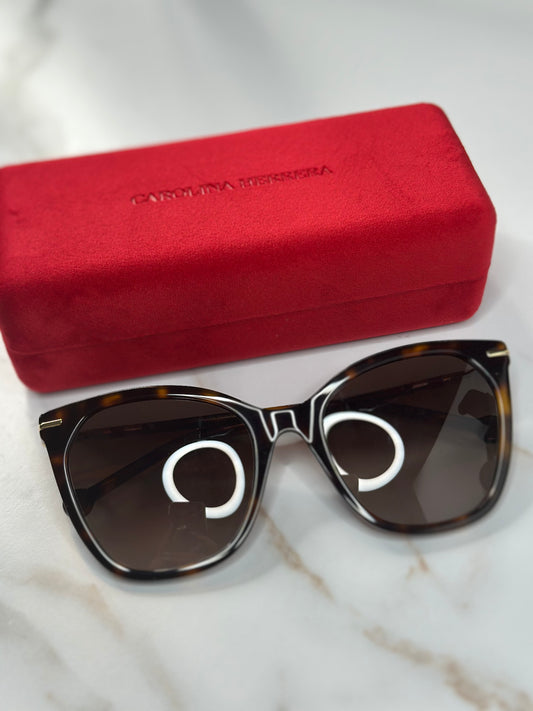 ￼Pre-owned Carolina Herrera tortoise sunglasses with enamel detail ￼
