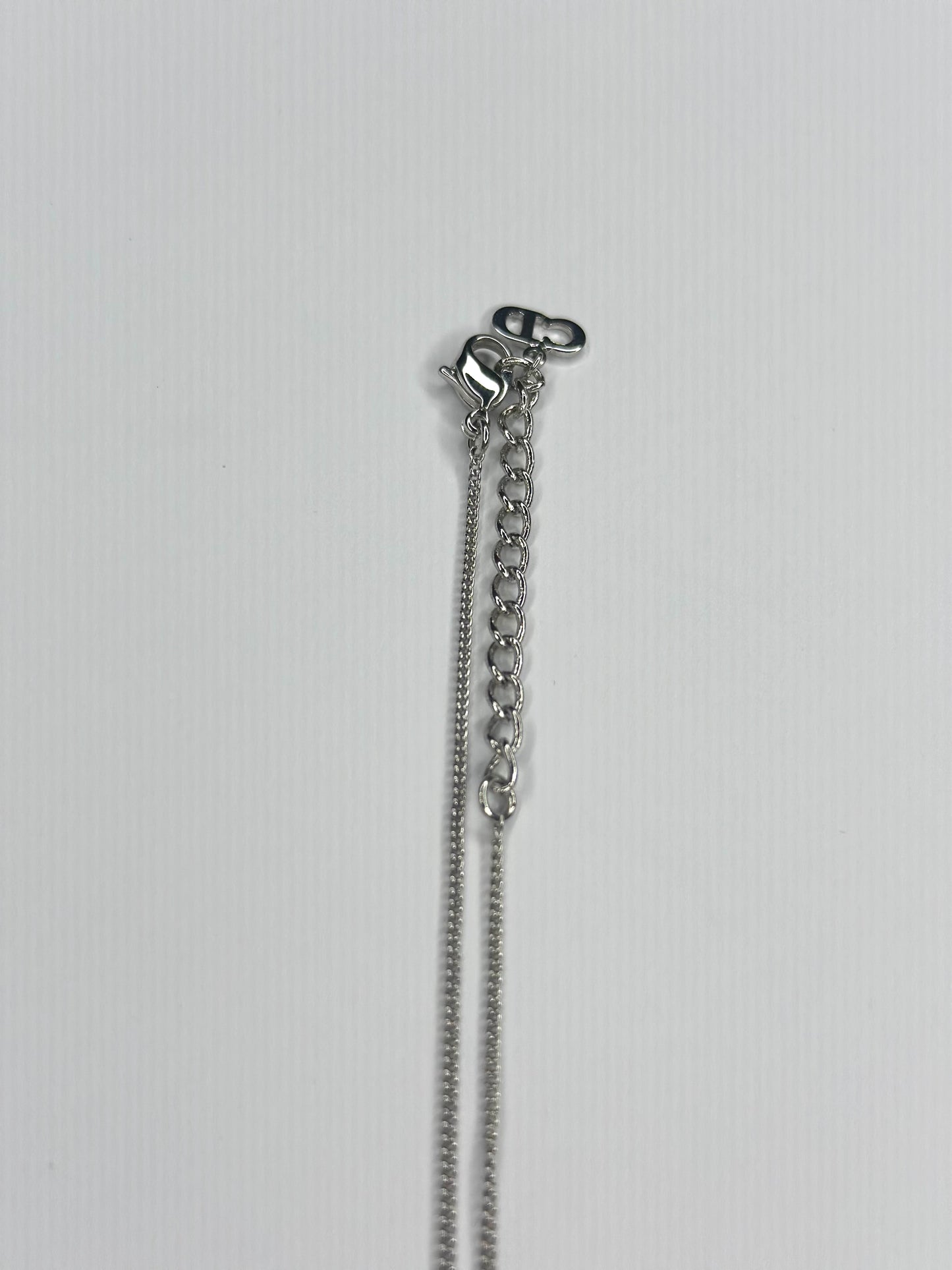 Pre-owned Christian Dior, silver logo pendant necklace