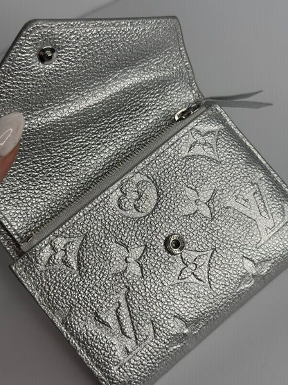 Pre-owned Louis Vuitton metallic silver Empriente leather victorine wallet