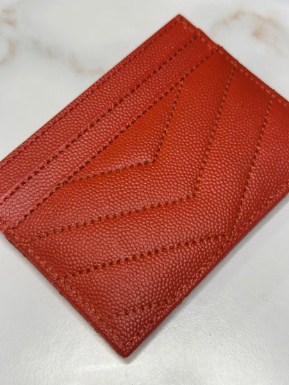 Pre-owned Saint Laurent orange-red grain de poudre card holder