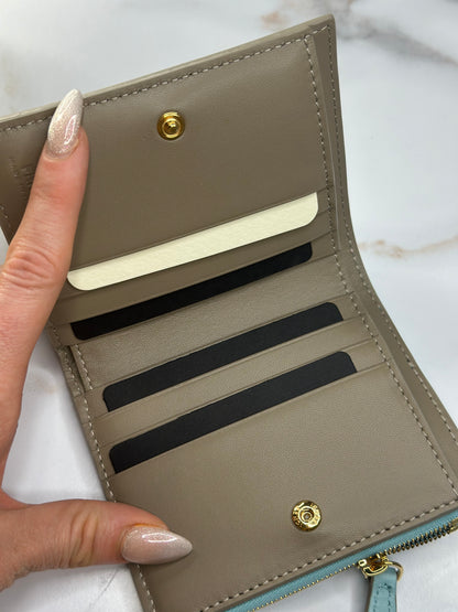 Pre-owned Fendi small baguette bi-fold wallet in light blue nappa leather
