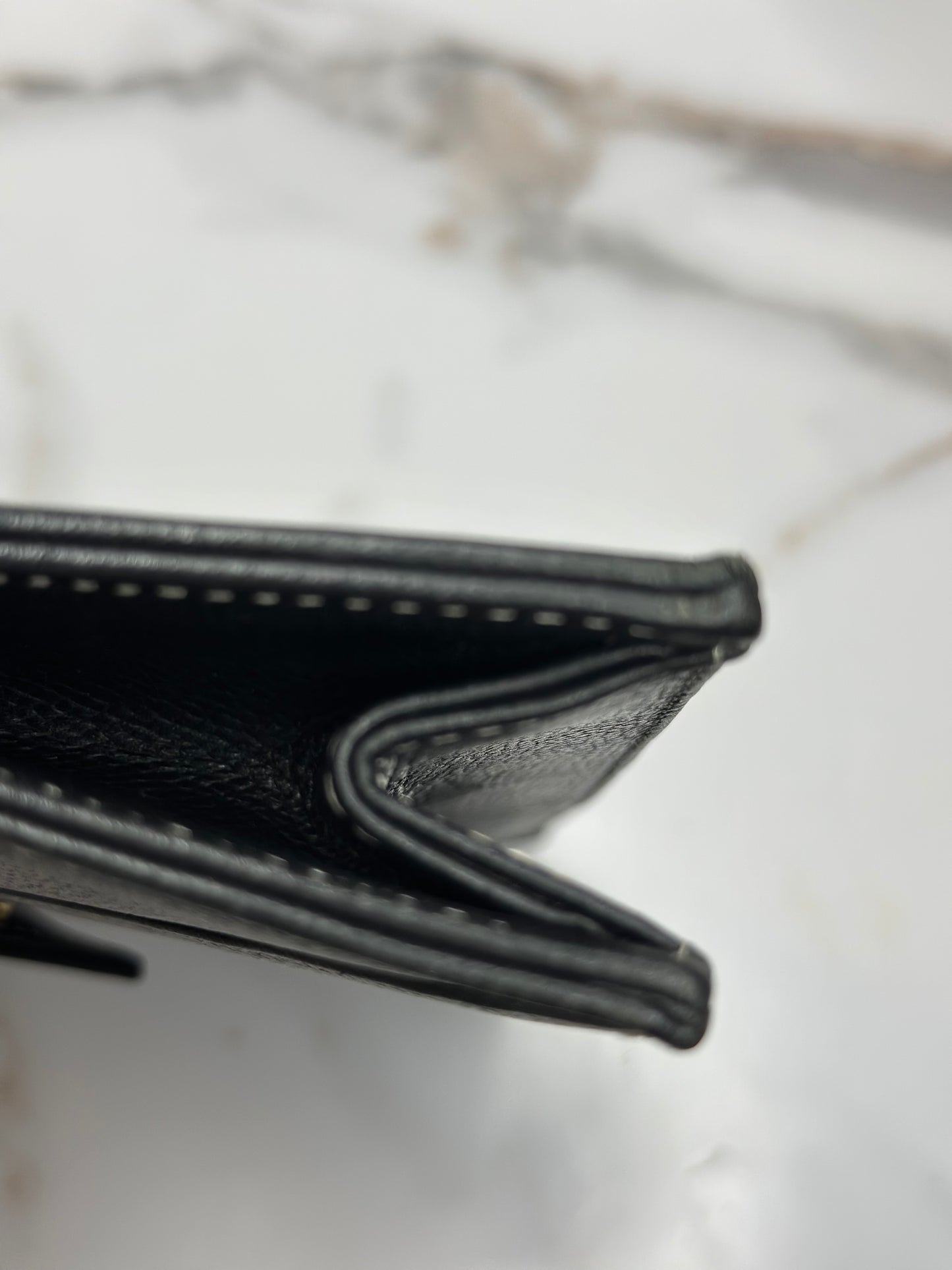 Pre-owned Saint Laurent pebbled leather black leather