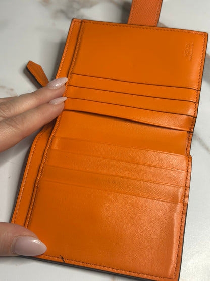 Pre-owned Fendi Zucca embossed leather compact wallet