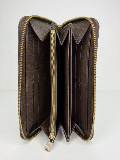 Pre-owned Louis Vuitton dark brown Empriente leather zippy wallet