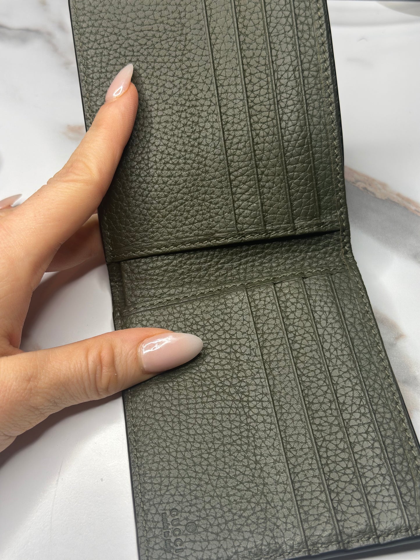 Pre-owned Gucci Jumbo GG bi-fold wallet in green full-grain leather
