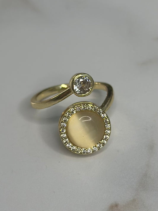 Adjustable round stone ring
