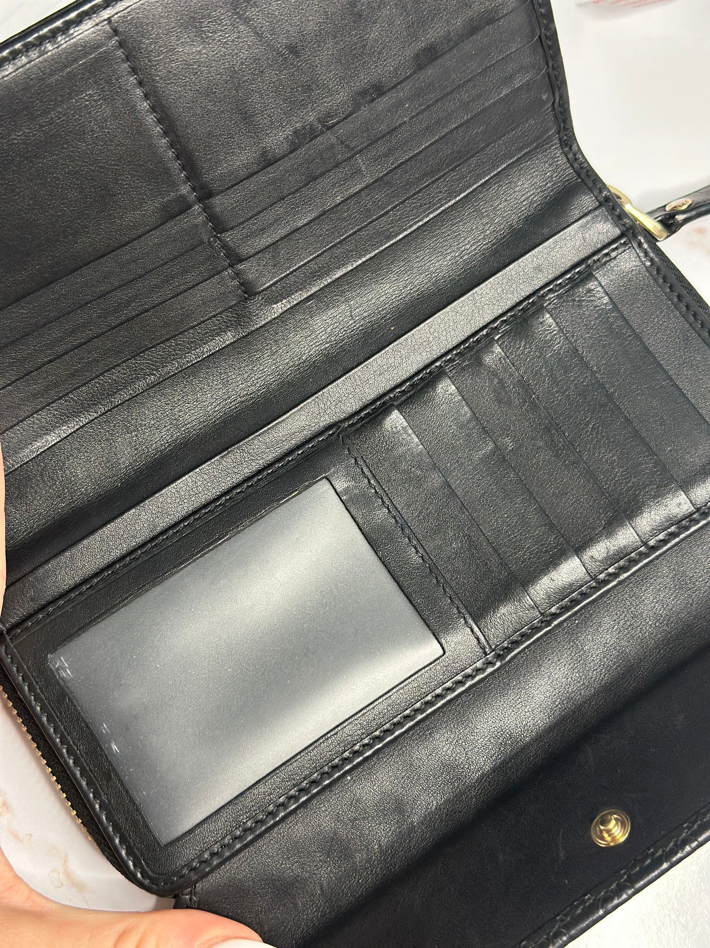 Pre-owned Gucci black Microguccisima embossed zippy wallet