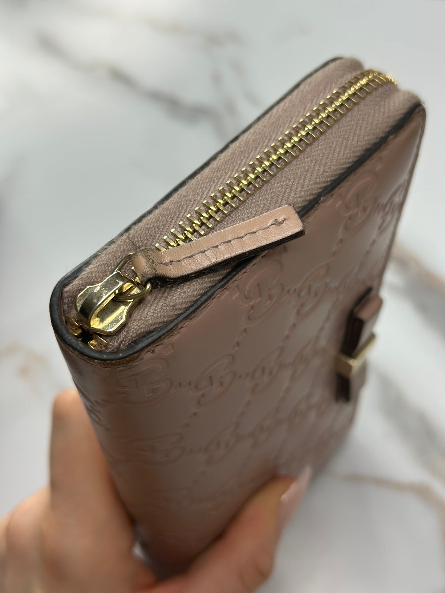 Pre-owned Gucci Guccissima continental zip-around wallet with a bow detail in a rose beige leather